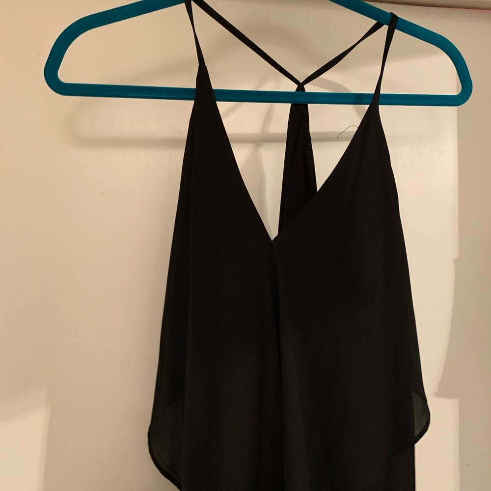 Black thin strapped, open back dress.
